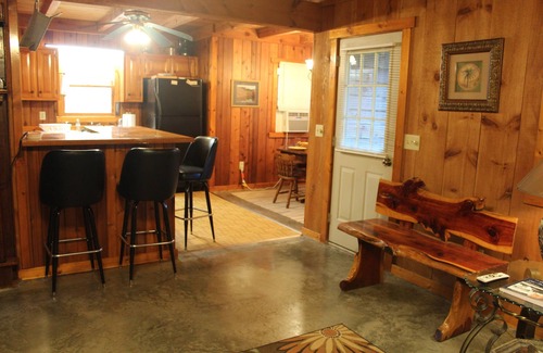 Sunset Cabina | Charming Cabin in the Eastatoee Valley, and a deck on the river.