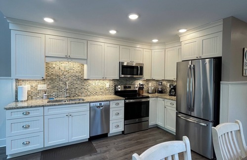 Glen Arbor Casa | Glen Arbor Condo en el río Crystal en The Homestead