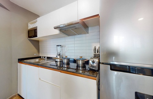 Centro de Cancún Hotel | Charming condo with kitchenette, balcony, & pool