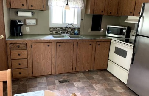 Tomahawk Cabaña | Charming Cottage by Lake Nokomis