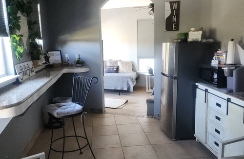 Cypress Cabaña | Charming cottage in Cypress with lake view ,WiFi, AC and relaxing outdoor patio.