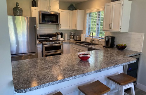 Elk Rapids Casa | Charming Cottage on Elk River in Elk Rapids – Your Summer Getaway Awaits!