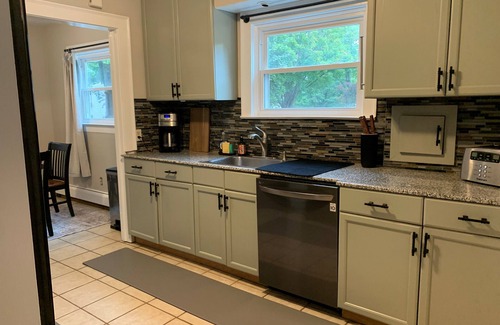 Jamestown Casa | Charming Cottage w/Fireplace, Fenced Yard & Basement Game Room!