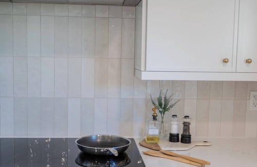 Butler Beach Cabaña | Charming Cottage with Sauna, MINI Golf, 2 OD Showers, Firepit, 2 Tubs and more!!