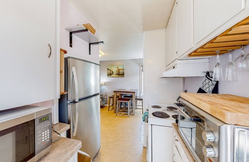 West Slope Cabaña | Charming cottage with a private hot tub, gas grill, & furnished patio