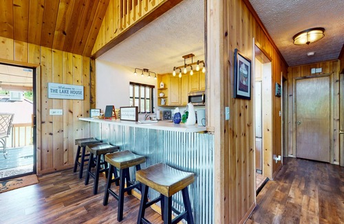 Big Creek Casa | Charming dog-friendly lakefront home w/dock, firepit, huge deck