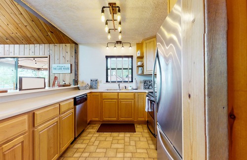Big Creek Casa | Charming dog-friendly lakefront home w/dock, firepit, huge deck