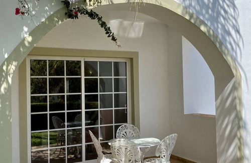 Praia da Luz Apartamento | Charming garden apartment with generous verandah, 3 minutes walk from beach.