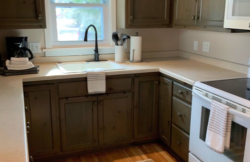 Ellison Bay Cabaña | Charming garden cottage downtown Ellison Bay walking distance to lake and shops