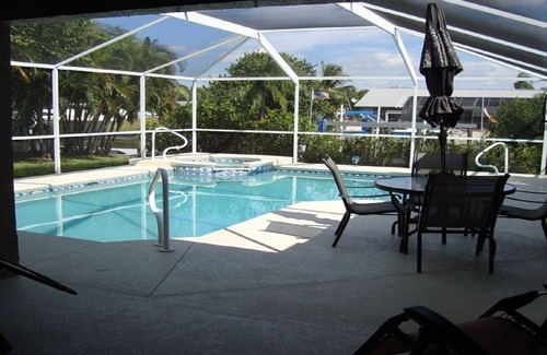 Fort Myers Casa | Acceso Golfo Hermosa casa sobre el agua, con piscina, muelle privado climatizada y jacuzzi