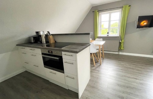 Ockholm Apartamento | Charming Holiday Apartment in Reetdachhaus Bongsiel, Ockholm