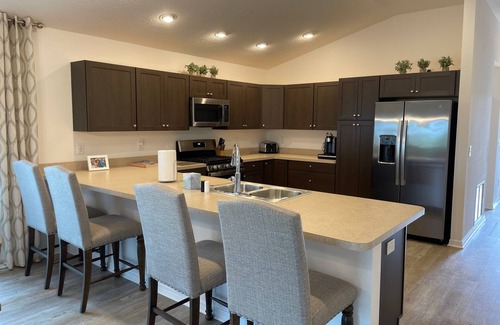 Okahumpka Casa | Charming home w/spacious kitchen, water view, enclosed lanai, & Pet Friendly