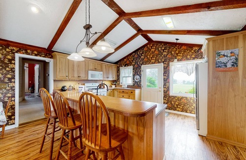 Penn Yan Casa | Charming home with firepit, skiing nearby, full kitchen, central AC, & W/D