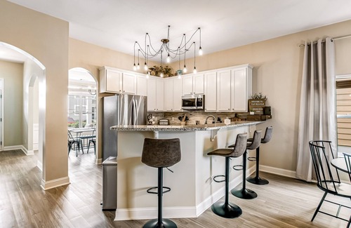 Port Wentworth Casa | Charming, immaculate coastal home with furnished porches, AC, & washer/dryer