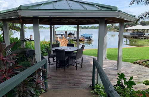 Highland Casa | Charming Lake View House on Redwater Lake with dock, gazebo, and hot tub.