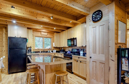 Boothbay Cabina | Charming, Lakefront Cabin with a Fireplace, Wood Stove, Kayaks, & Sandy Beach