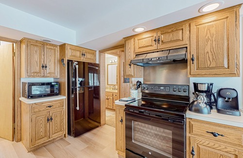 Conover Casa | Charming lakefront home with dock, fireplace, streaming, lake views, W/D, & AC