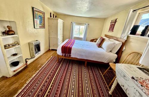 San Cristobal Casa | Charming Log Cabin Rental on Eco-Farm near Taos Ski Valley