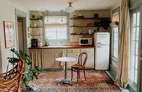 Midtown Cabaña | Charming midtown cottage with central air and driveway parking, great location