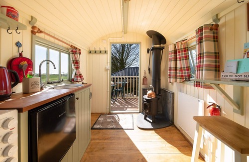 Stoke Rivers Cabina | Charming quirky couple and dog friendly countryside bolt hole, with private hot tub and communal gam