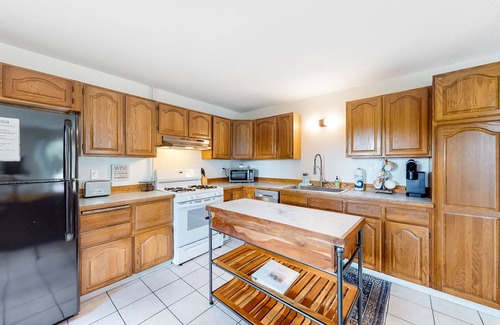 Branchport Casa | Charming retreat with private hot tub, fireplace, & furnished patio