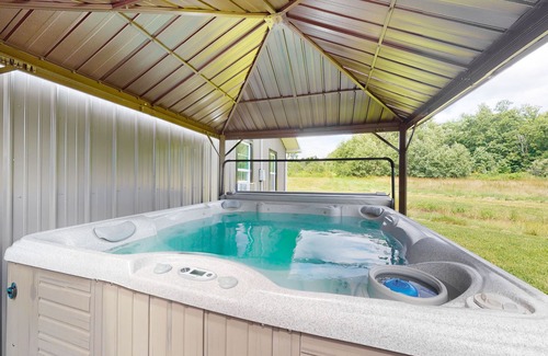 Branchport Casa | Charming retreat with private hot tub, fireplace, & furnished patio
