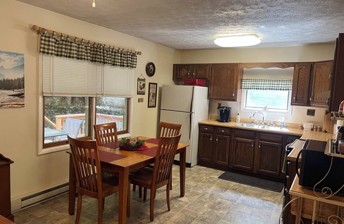 Elkins Casa | Charming riverfront home with beautiful views, hot tub and game room. Fishing!