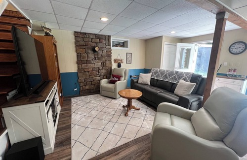 Elkins Casa | Charming riverfront home with beautiful views, hot tub and game room. Fishing!