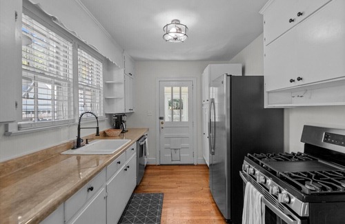 Rosewood Casa | Charming Rosewood bungalow with incredible backyard oasis with in-ground pool.