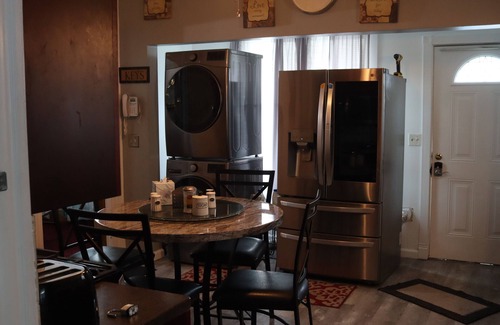 Geneva Casa | Charming, Spacious 3 bedroom house W/ WiFi, AC in Geneva -Hot Tub - Outside Bar