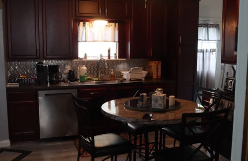 Geneva Casa | Charming, Spacious 3 bedroom house W/ WiFi, AC in Geneva -Hot Tub - Outside Bar