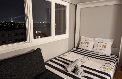 Quartier de la Folie-Mericourt Apartamento | Charming Studio with Eiffel View