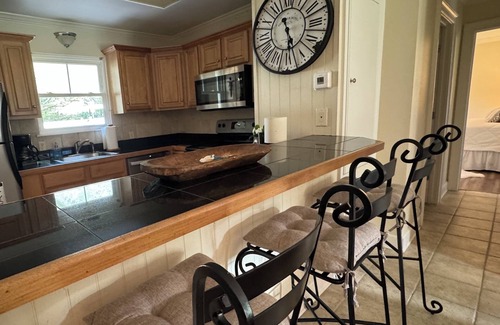 Magnolia Springs Casa | Charming two bedroom cottage steps away from Magnolia River in Magnolia Springs