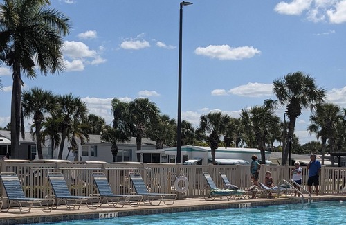 Fort Myers Beach Cabaña | Charming vintage beach trailer w/ resort amenities, just outside Sanibel Island!