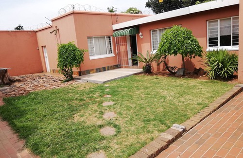 Germiston Casa | Charnom Luxurious accommodation with cctv and electric fence