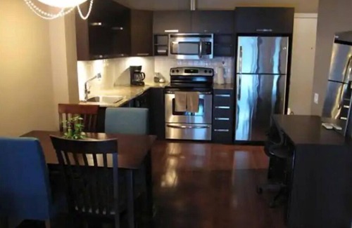 International District Condominio | Chic Luxury Downtown Condo with Pool & Garage !