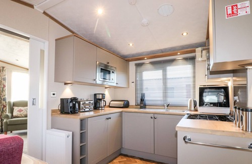 Chichester Cabaña | CHICHESTER LAKESIDE HOLIDAY PARK, pet friendly in Chichester