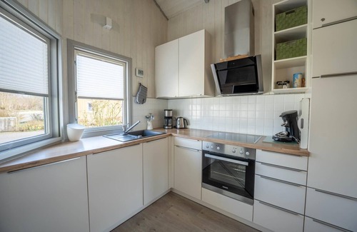 Norderteil Casa | Child-friendly 5-person wellness holiday home Treibholz with two showers and toilets, sauna, whirlpool, wood-burning stove, conservatory and canoe in Otterndorf