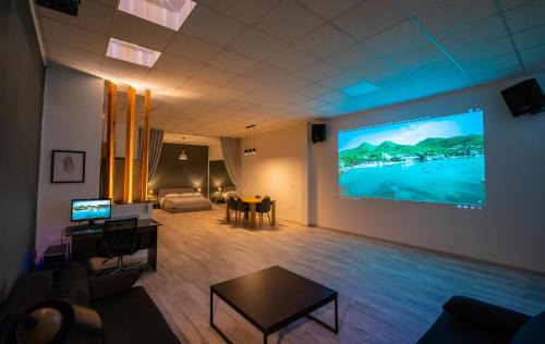 Spata-Artemida Apartamento | Cinema Zeus Studios - by Avelink