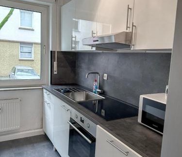Sudostviertel Apartamento | City Apartments Essen for up to 6 person with 4K TV and kitchen