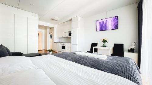 Oulu Apartamento | City center 1R studio with perfect view, parking