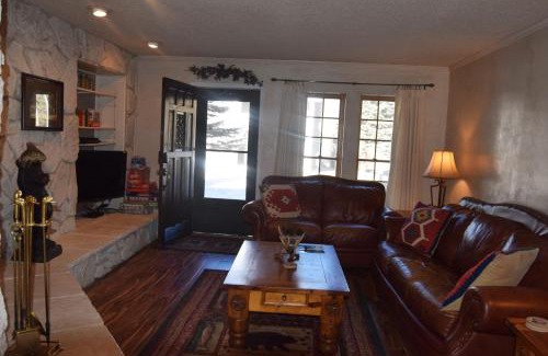 Red River Casa | Claim Jumper Townhouse 16 - On The River - Across from the Fishing Ponds - In Town - Near The Ski Area - Fireplace - WiFi - Sate