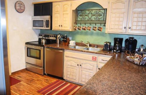Red River Casa | Claim Jumper Townhouse 16 - On The River - Across from the Fishing Ponds - In Town - Near The Ski Area - Fireplace - WiFi - Sate