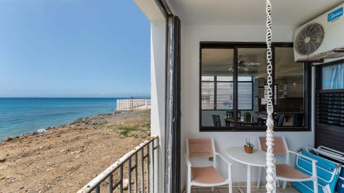 Stella Casa | Claje Sunset! Beachfront condo at Victoria del Mar 1E