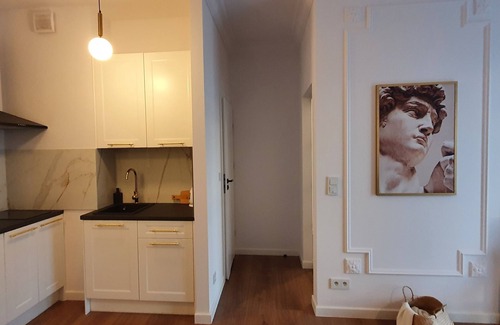 Warsaw Apartamento | Classical Warszaw Apartment inside building with garden on the roof