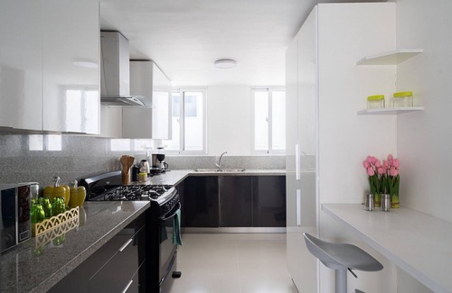 La Arboleda Condominio | Classy-3BR-KingBed-50mbWiFi-CityCntr-A/C-YellowKey