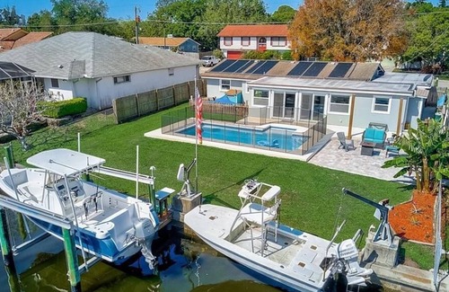 Fullers Earth Casa | Classy Cabana on the water, Private Heated Pool & Boat Lifts