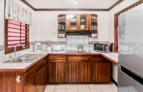 Damas Condominio | Clean & Bright Getaway W/ Shared Pool, Lush Gardens, & Ideal Location Near Town!
