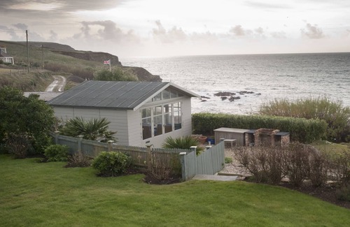 Gunwalloe Casa | Cliff Top Home con impresionantes vistas al mar desde casi todas las habitaciones de la casa.