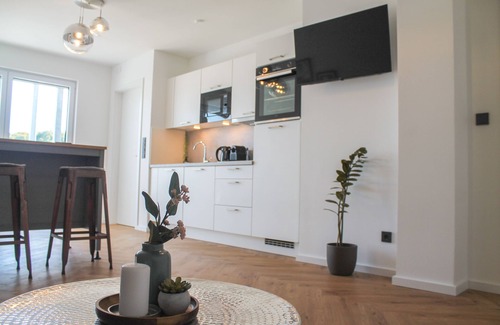 Rauental Apartamento | Close to the city center with parking space, balcony, lockable bike box & charging station